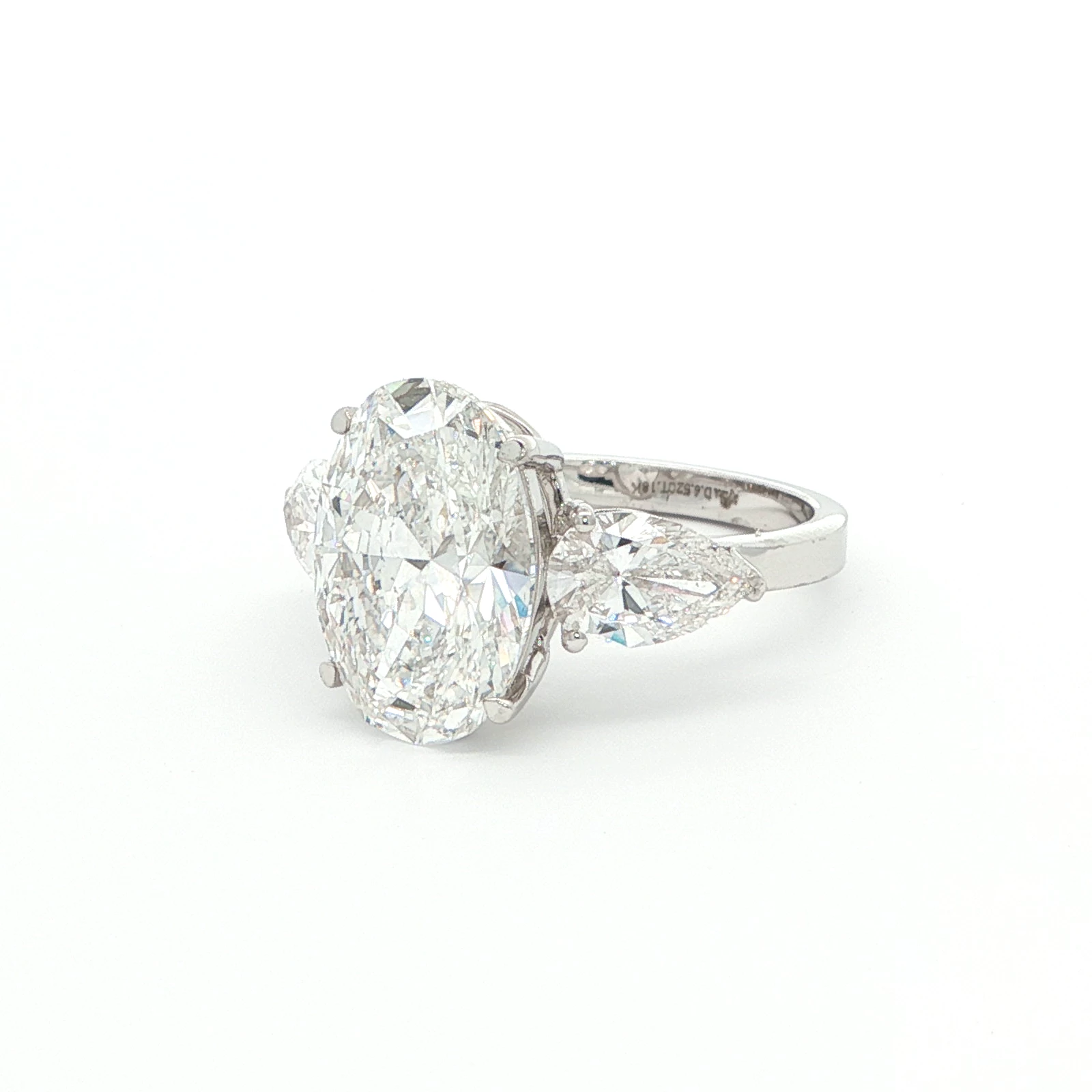 6.52 carat Oval and Pear Diamond Trilogy Ring