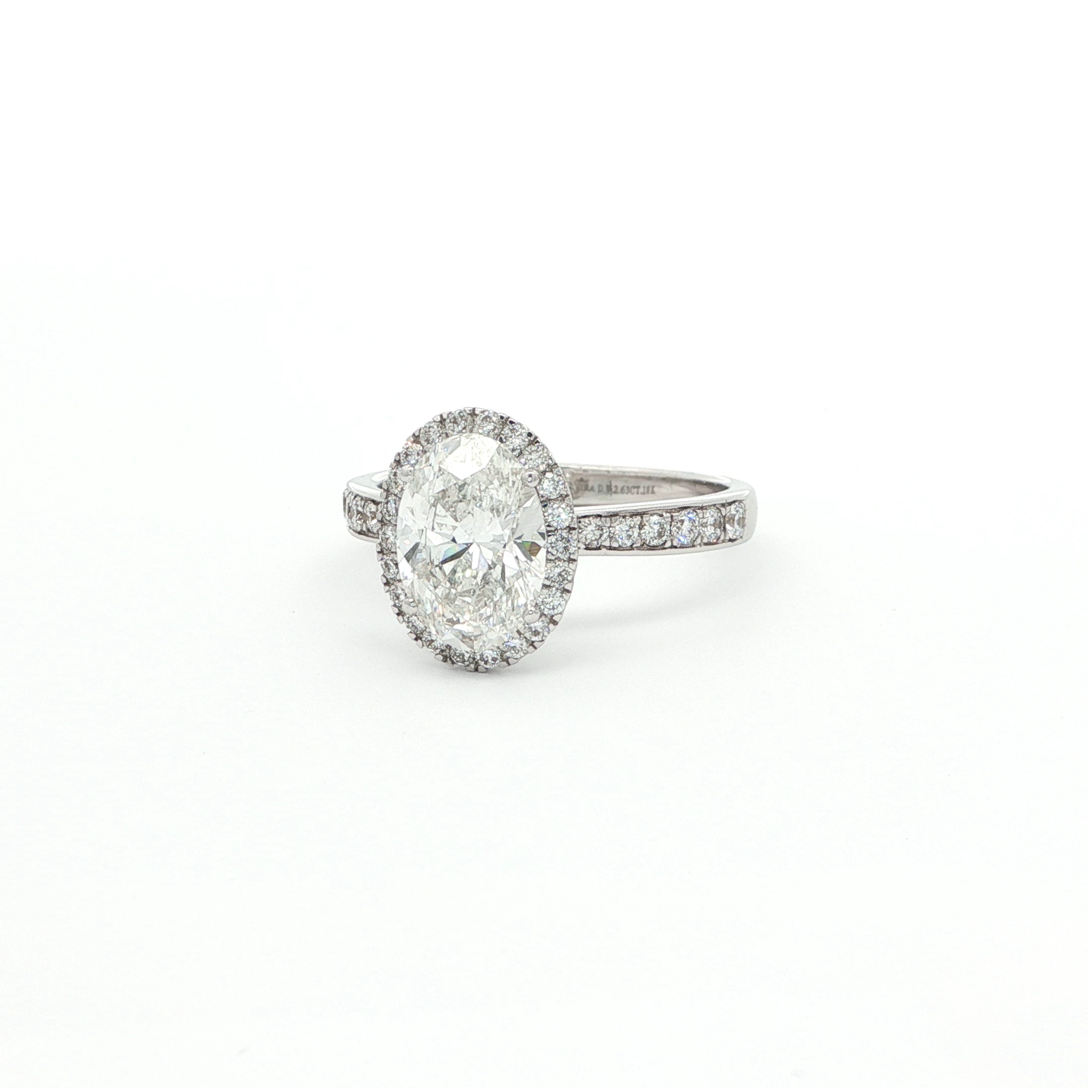 HALF ETERNITY OVAL DIAMOND RING